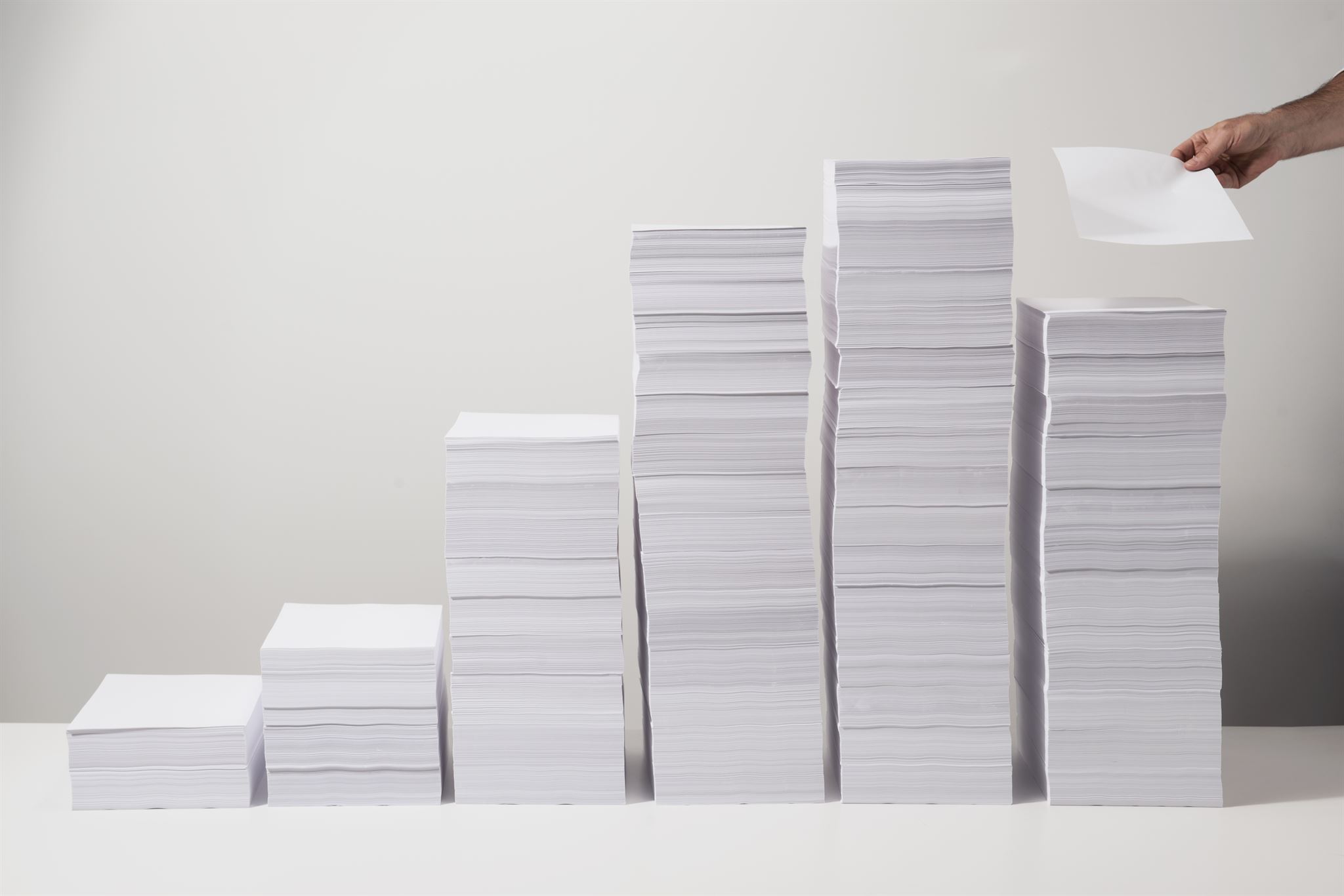 Employee overwhelmed with paperwork